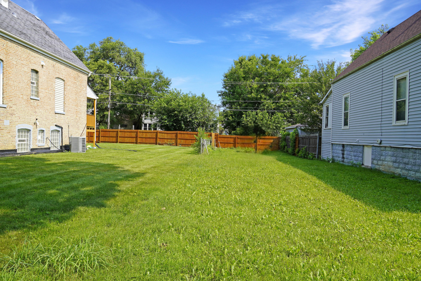 a view of a backyard with a garden