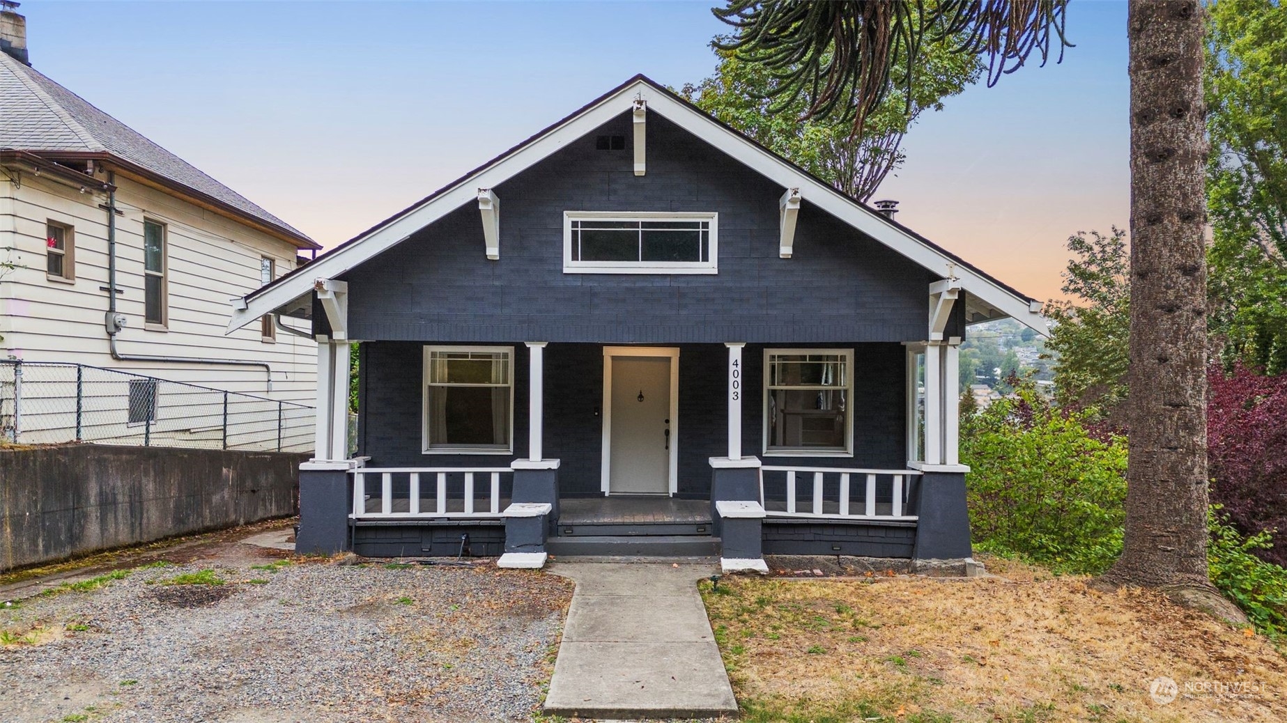 front view of a house with a yard