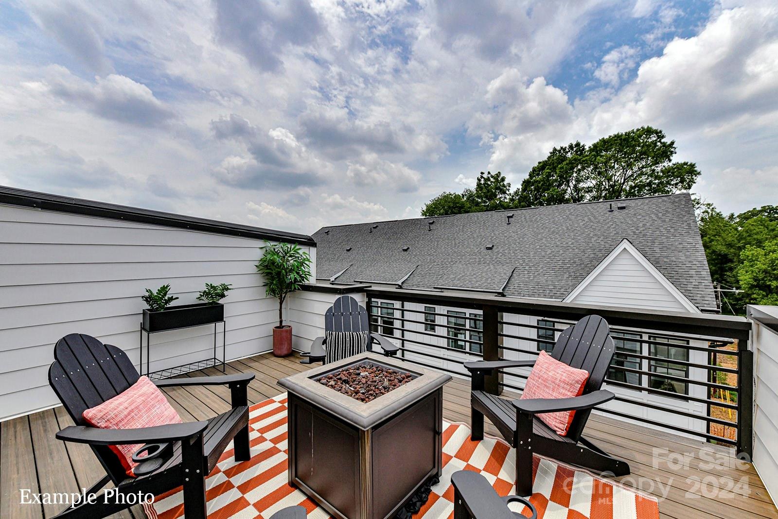 an outdoor space with furniture and stove