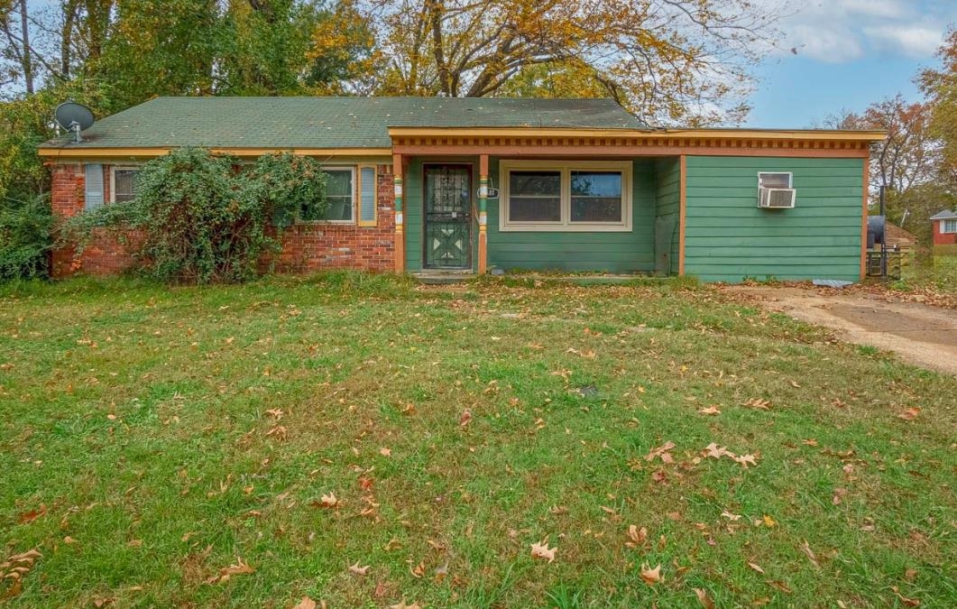 front view of a house with a yard