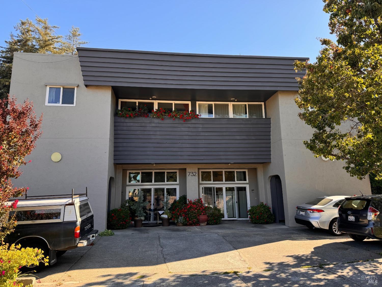 a front view of a house with a garage