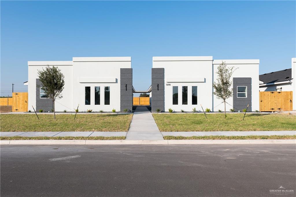 a view of house with outdoor space