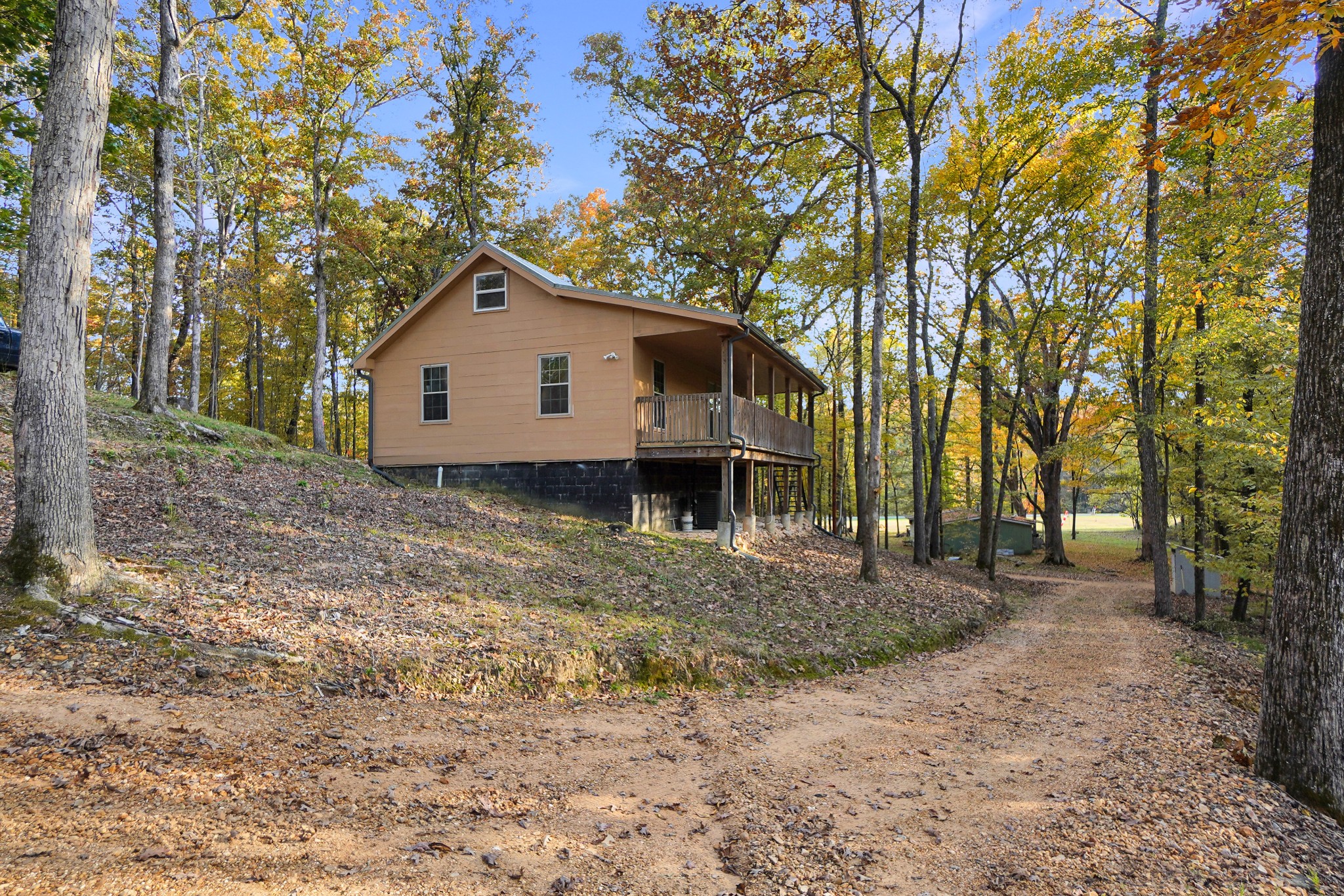 a house with trees in the background