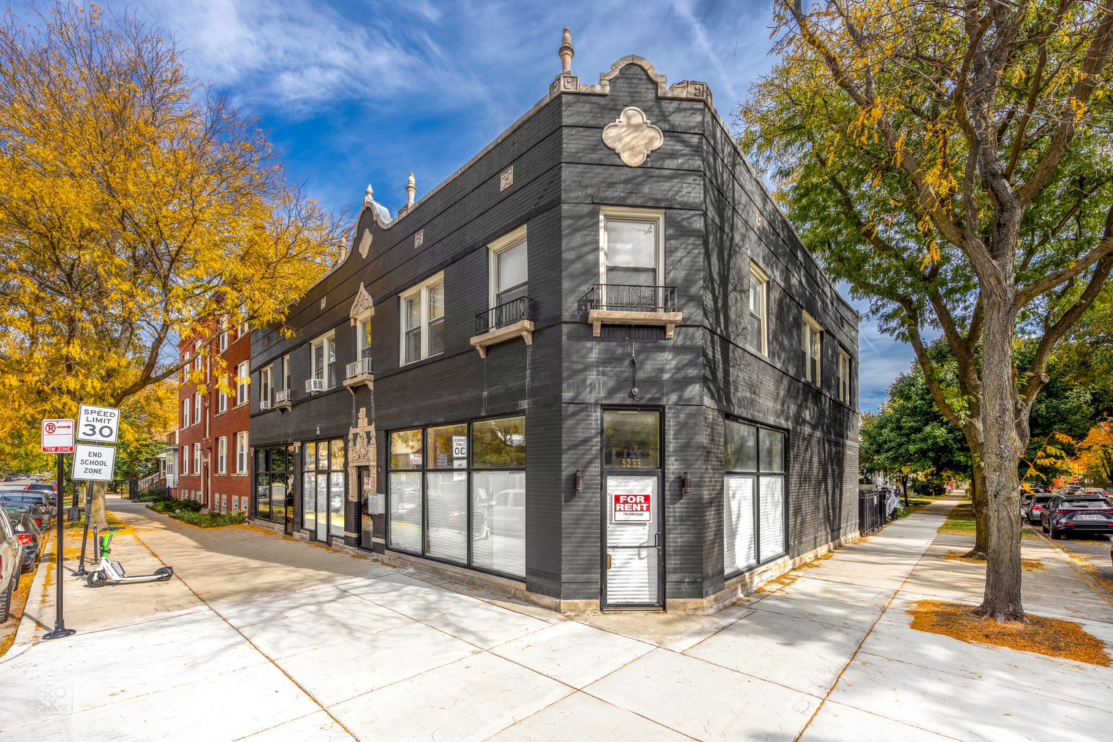 a view of a building with a street