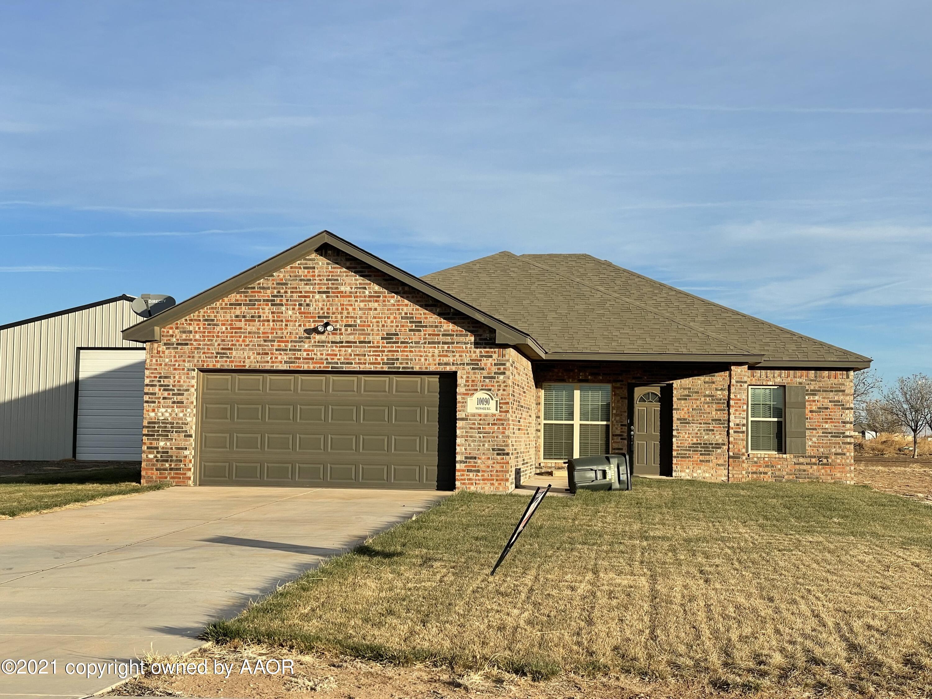 a view of front of house with garage