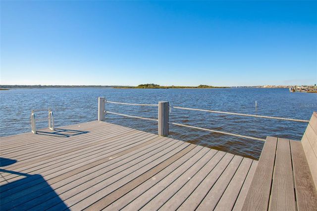 $979,000 | 115 Sunset Harbor Way, Unit 203 (GARAGE & BOAT SLIP) | Sunset Harbor