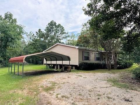 a house that has a lot of trees in it