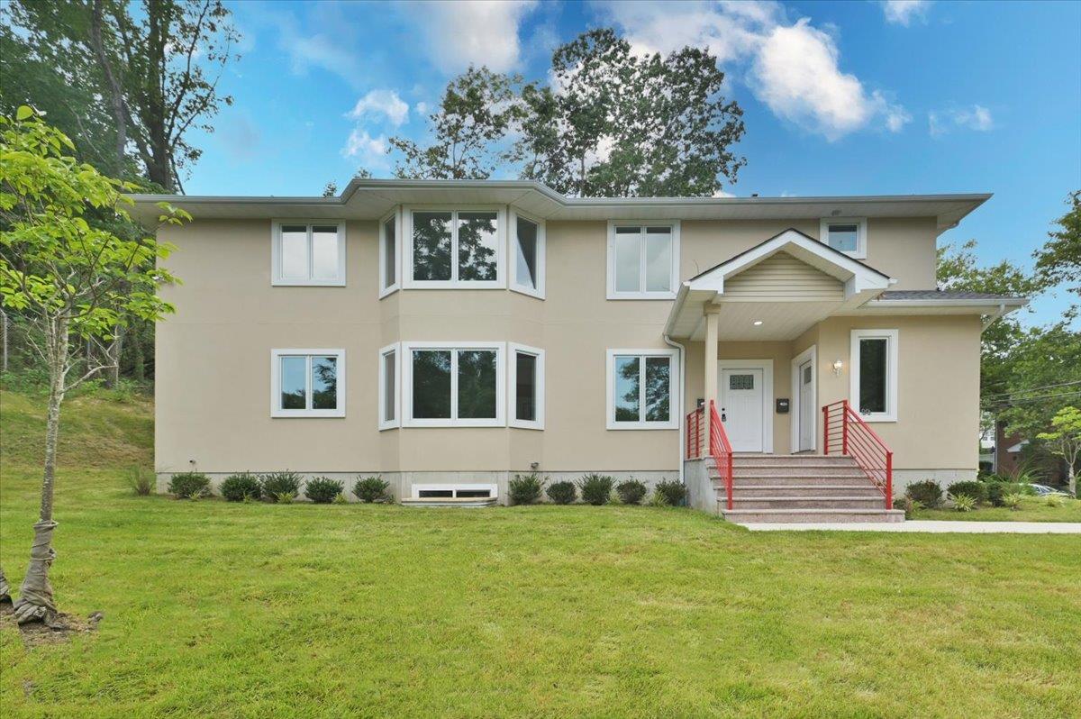 View of front of home with a front lawn