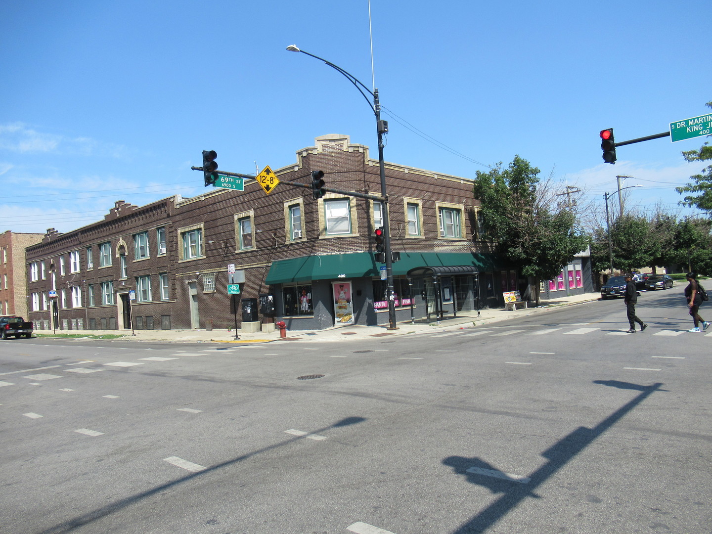 a front view of a building with street view