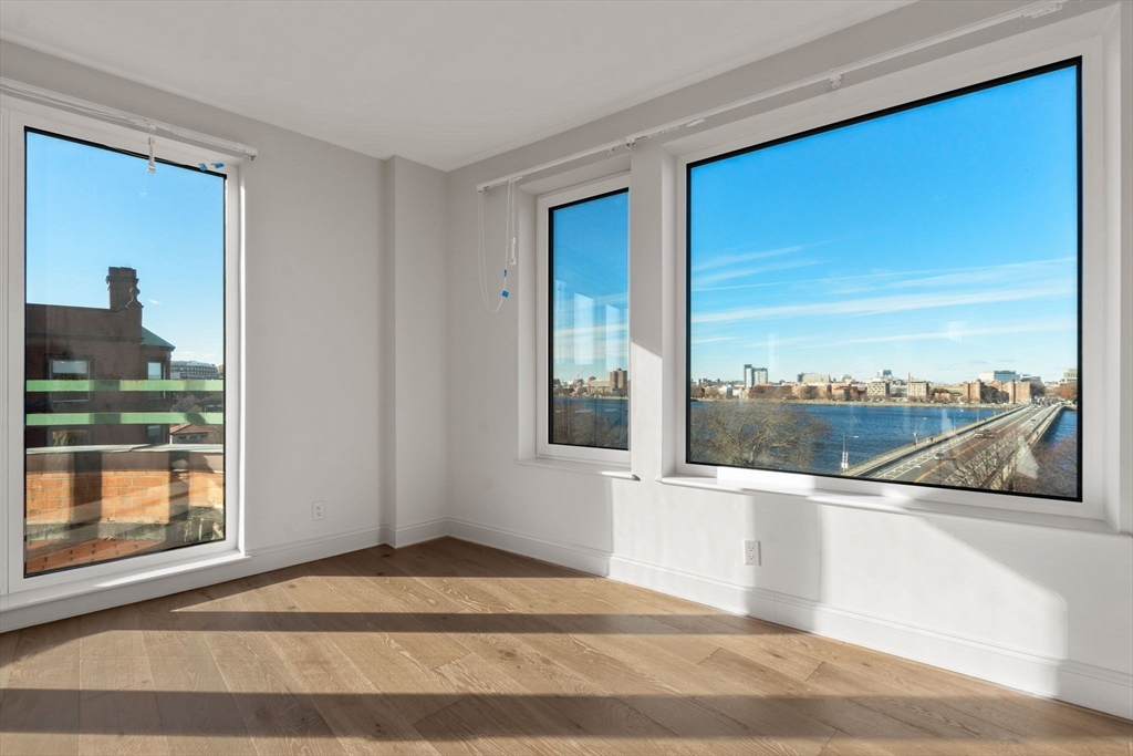 a view of a living room and a large window