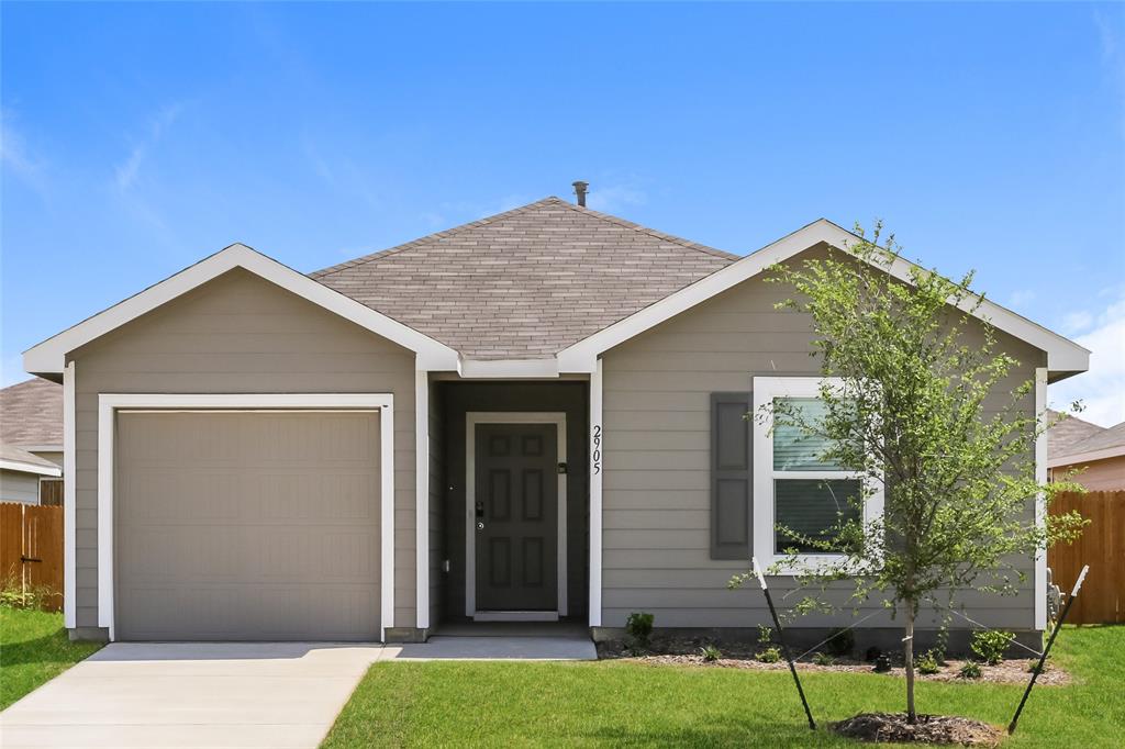 a front view of house with yard