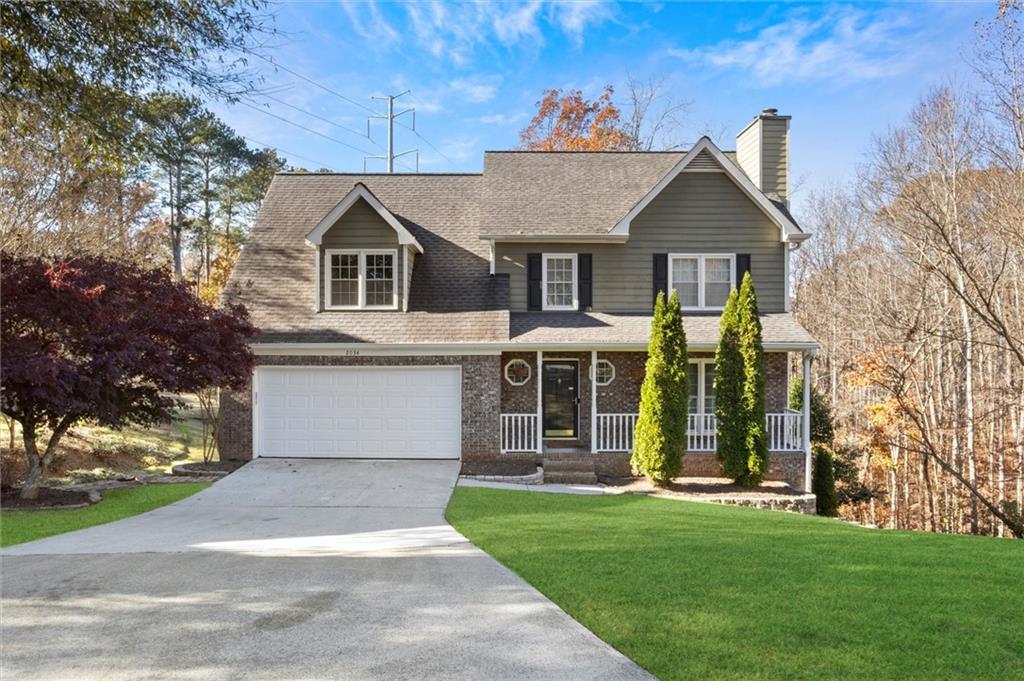 front view of a house with a yard