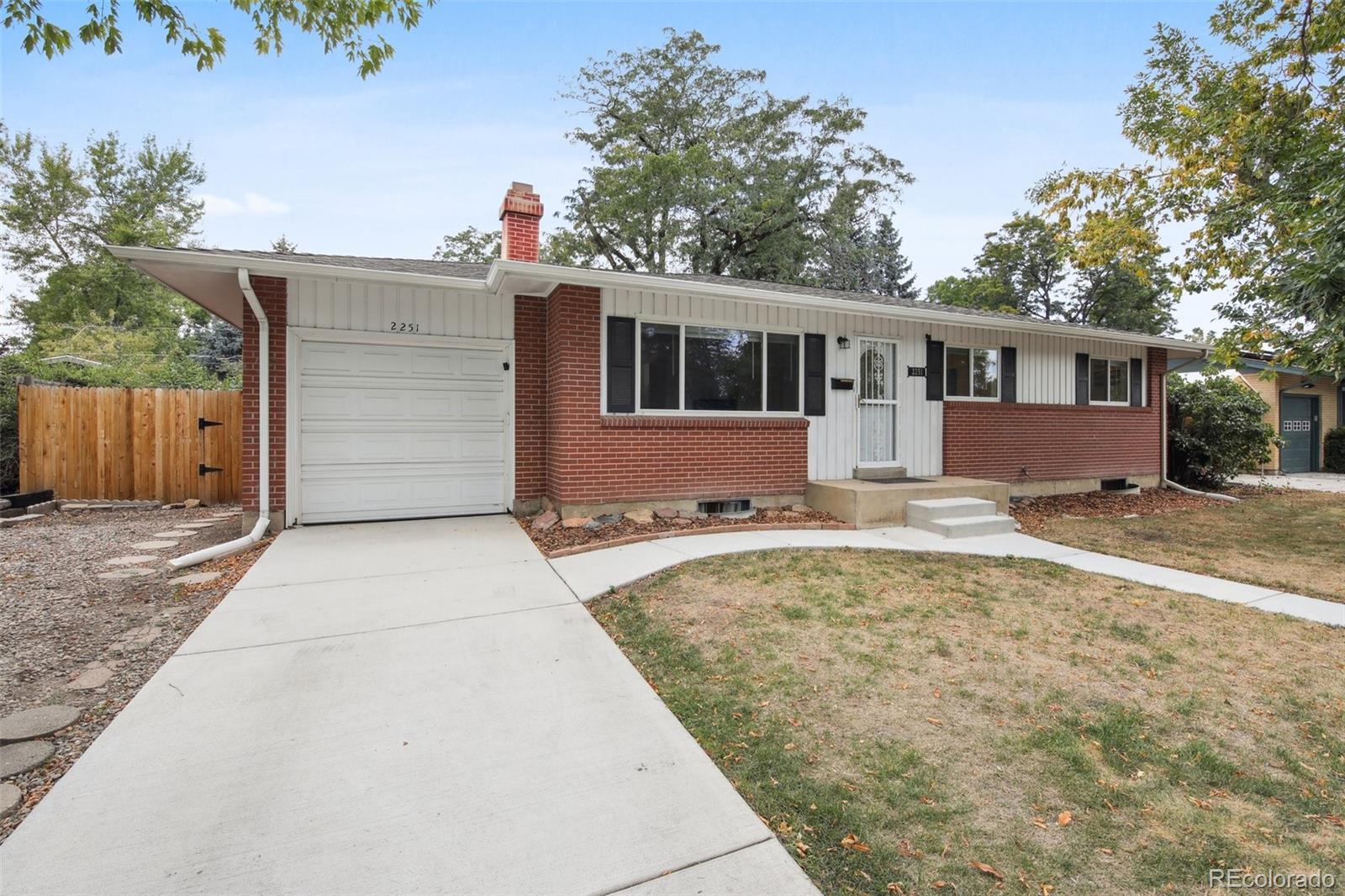 a front view of house with yard