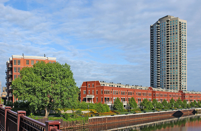 a view of a large building with a yard