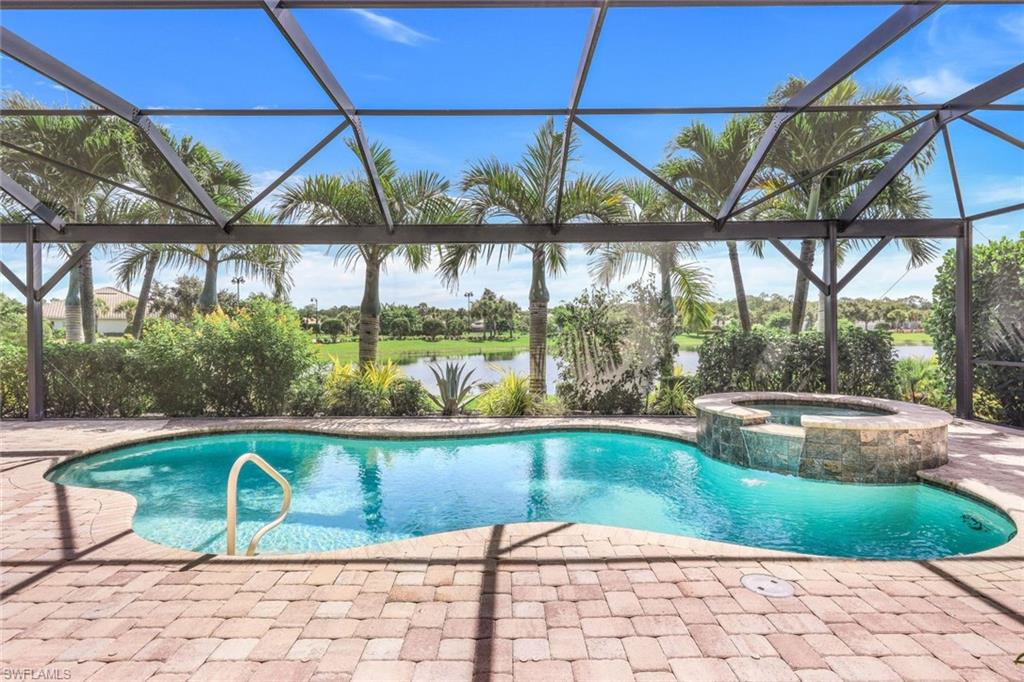 a view of outdoor space with swimming pool and furniture