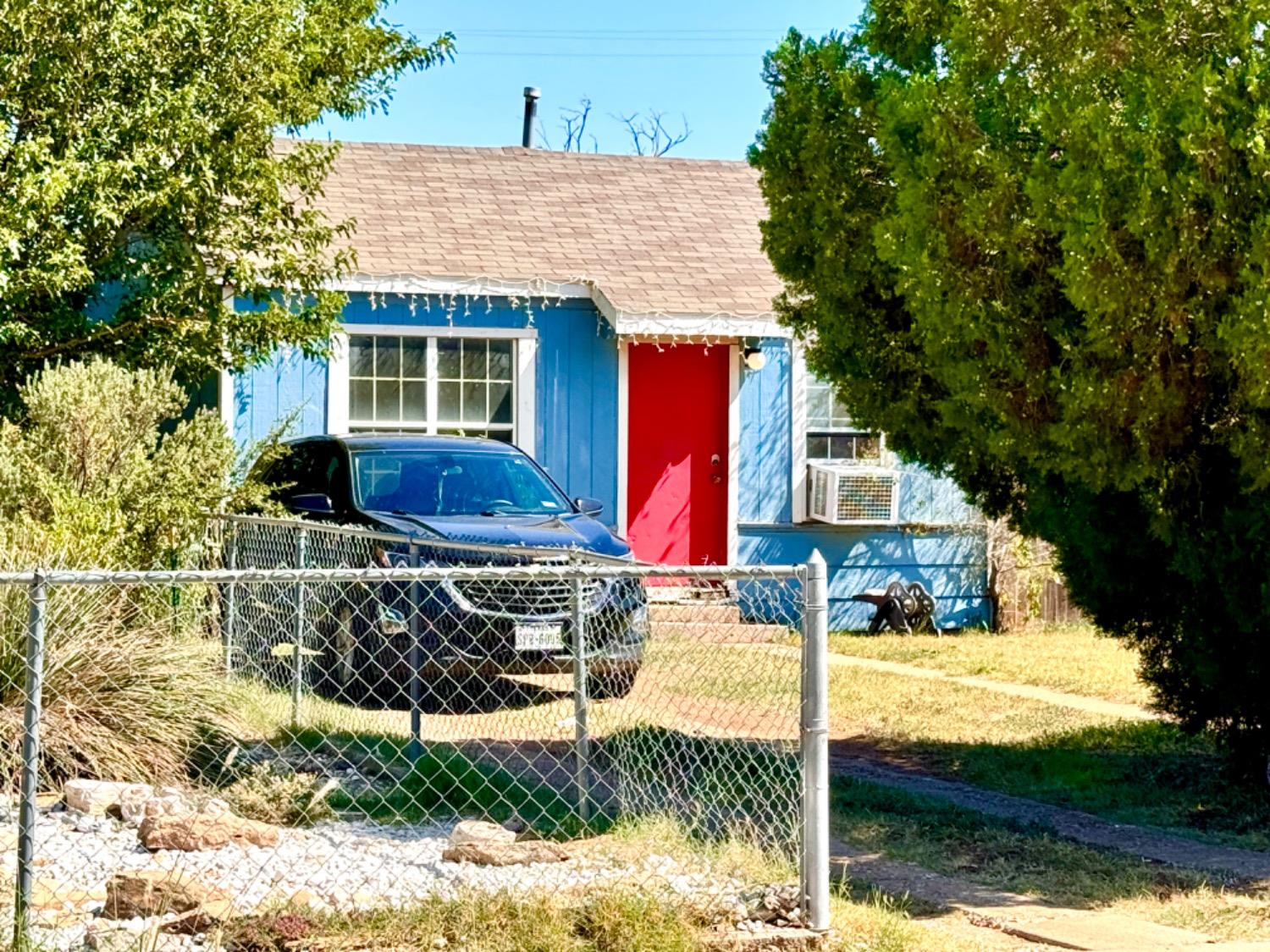 a view of house with outdoor space