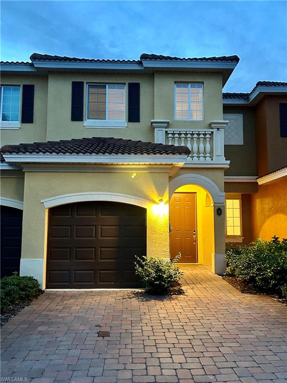 View of front of home featuring a garage