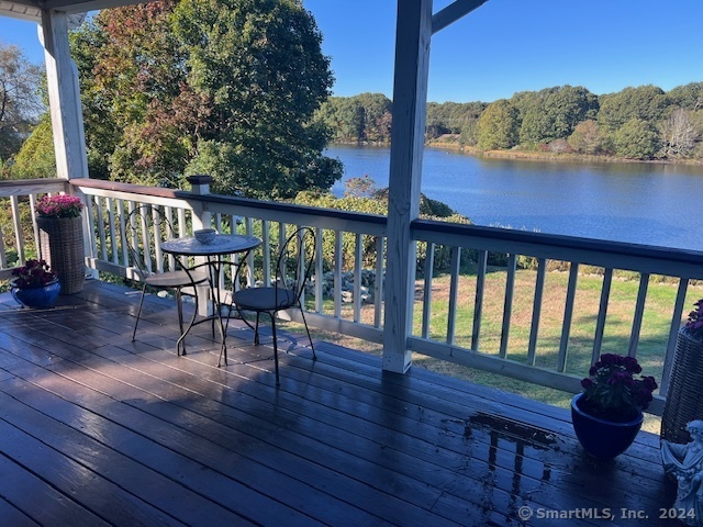 a view of a chairs and table in patio