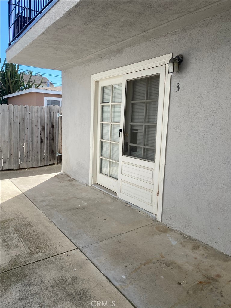 a view of backyard with a garage