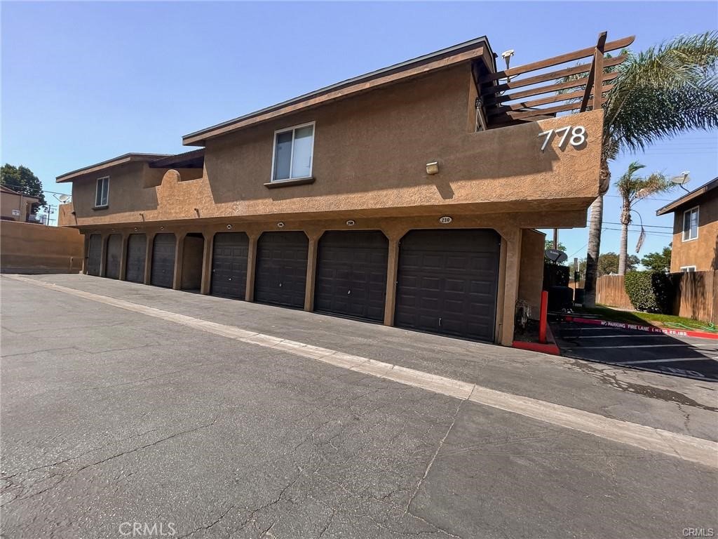 a front view of a house with a garage