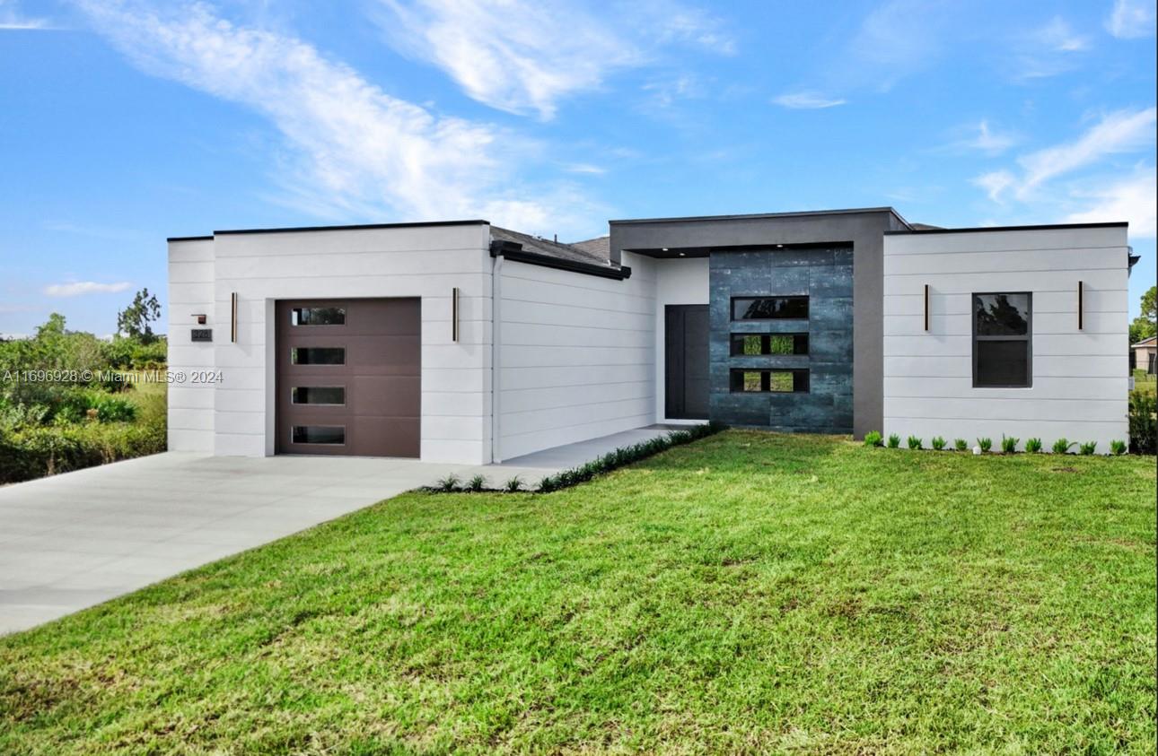 front view of a house with a yard