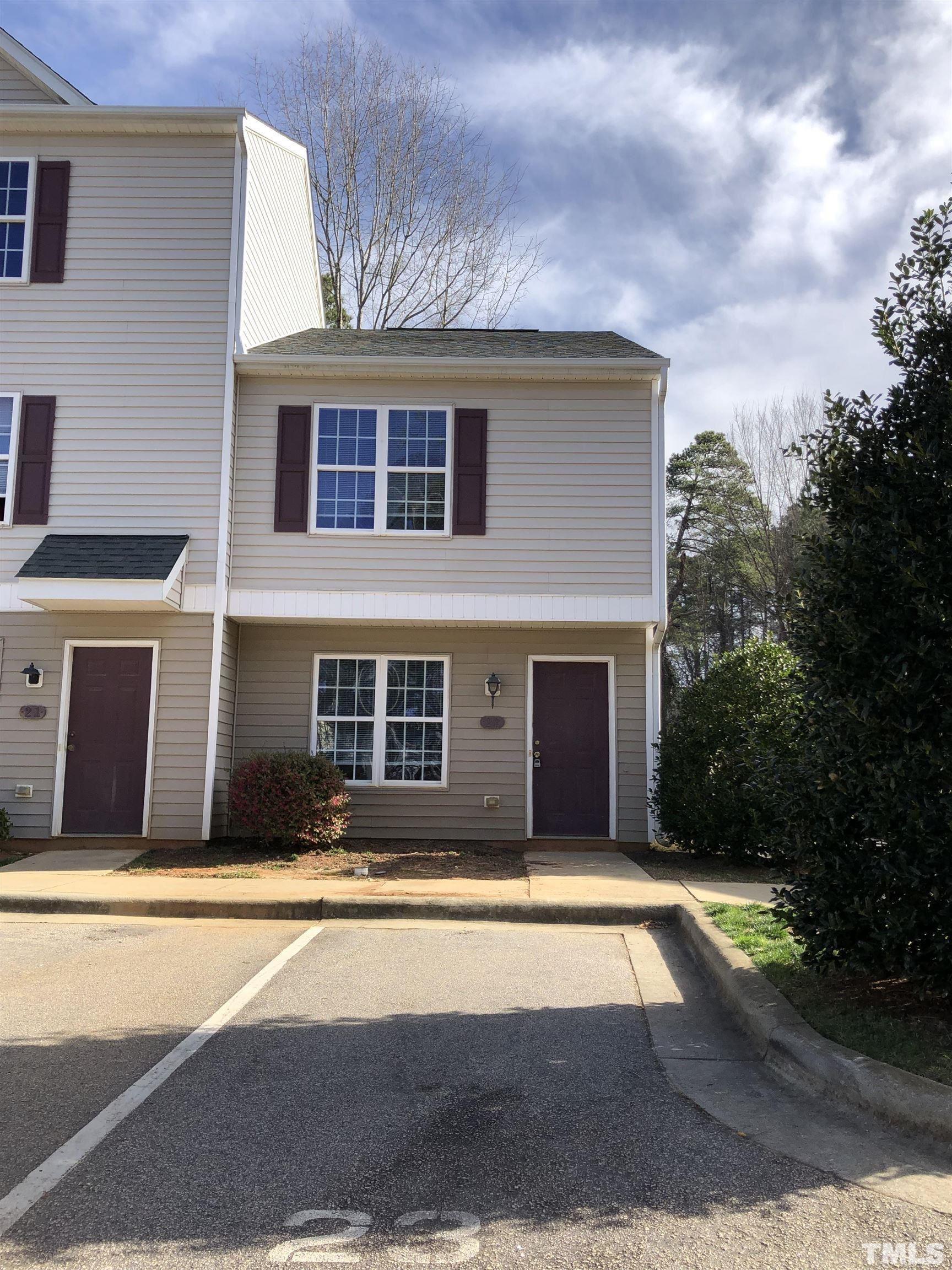 a house with trees in front of it