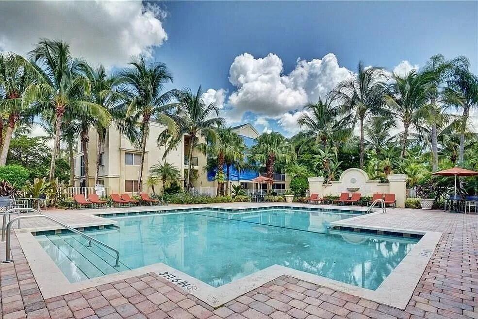 a view of swimming pool outdoor seating