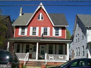 a front view of a house with parking