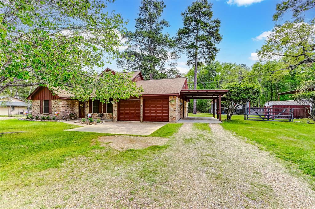 a view of house with outdoor space and entertaining space