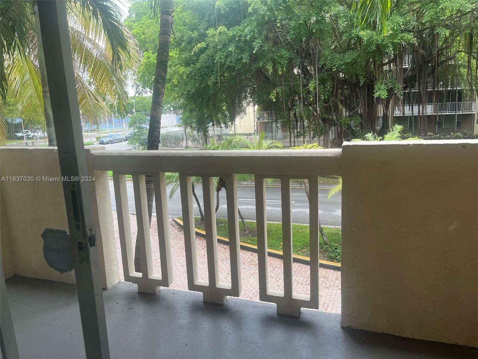 a view of a balcony with lake view