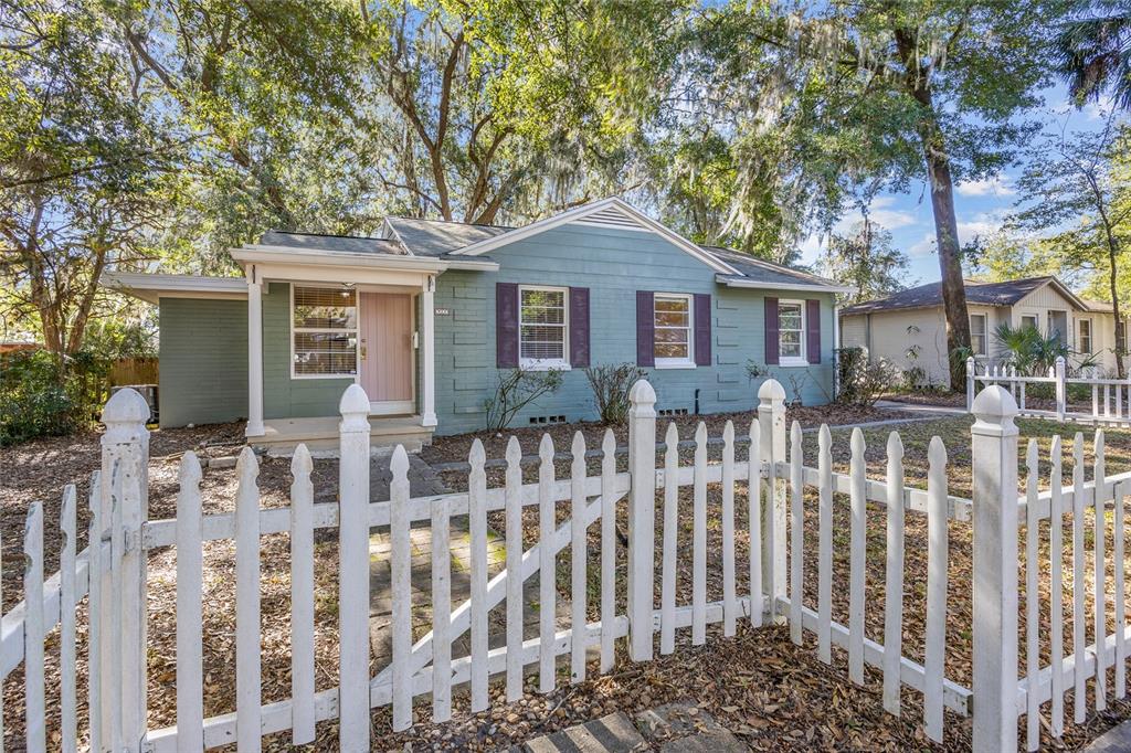 front view of a house with a small yard