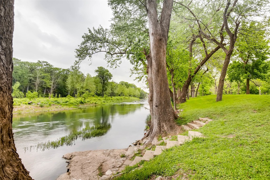 a view of lake with green space