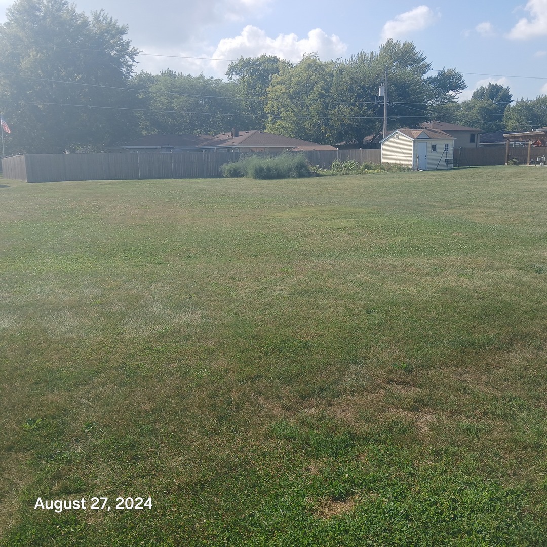 a view of outdoor space and yard