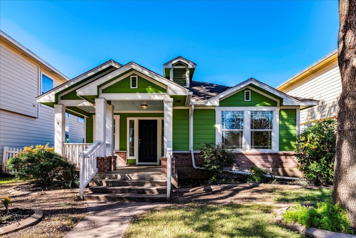 a front view of a house with porch