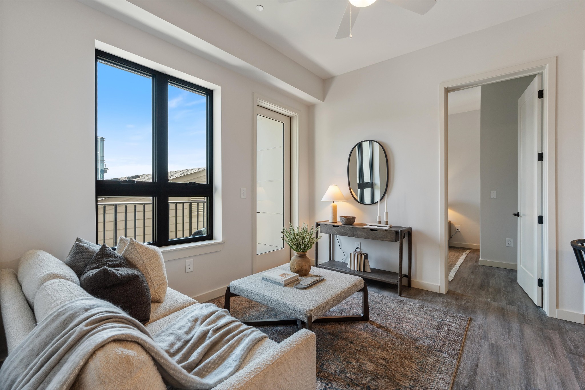 a living room with furniture and a window