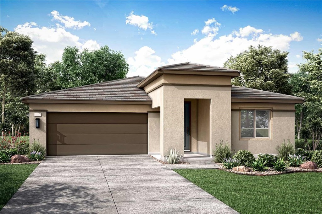 a front view of a house with a garage