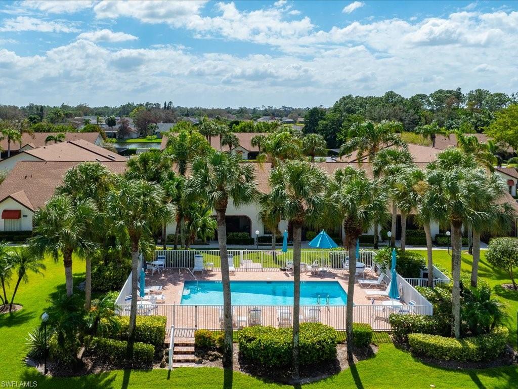 a view of a houses with a swimming pool