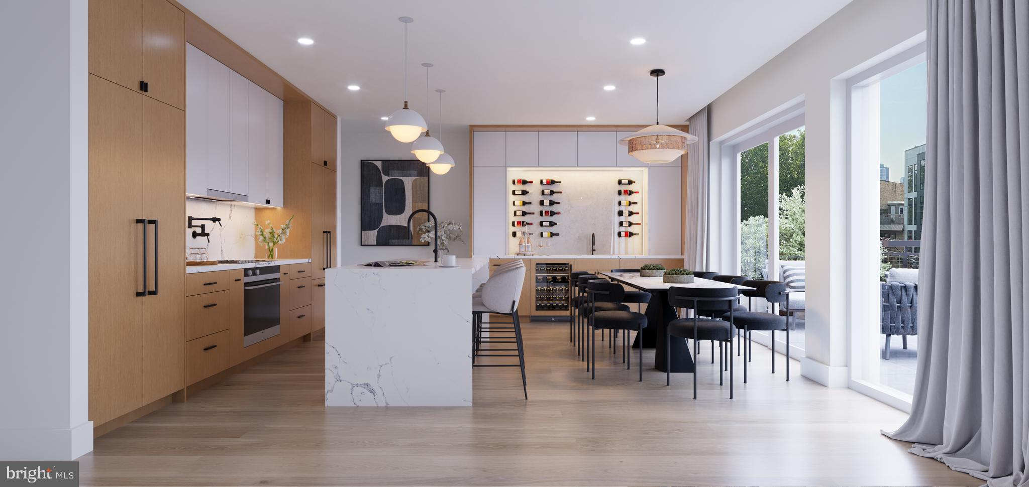 a kitchen with a table chairs refrigerator and cabinets