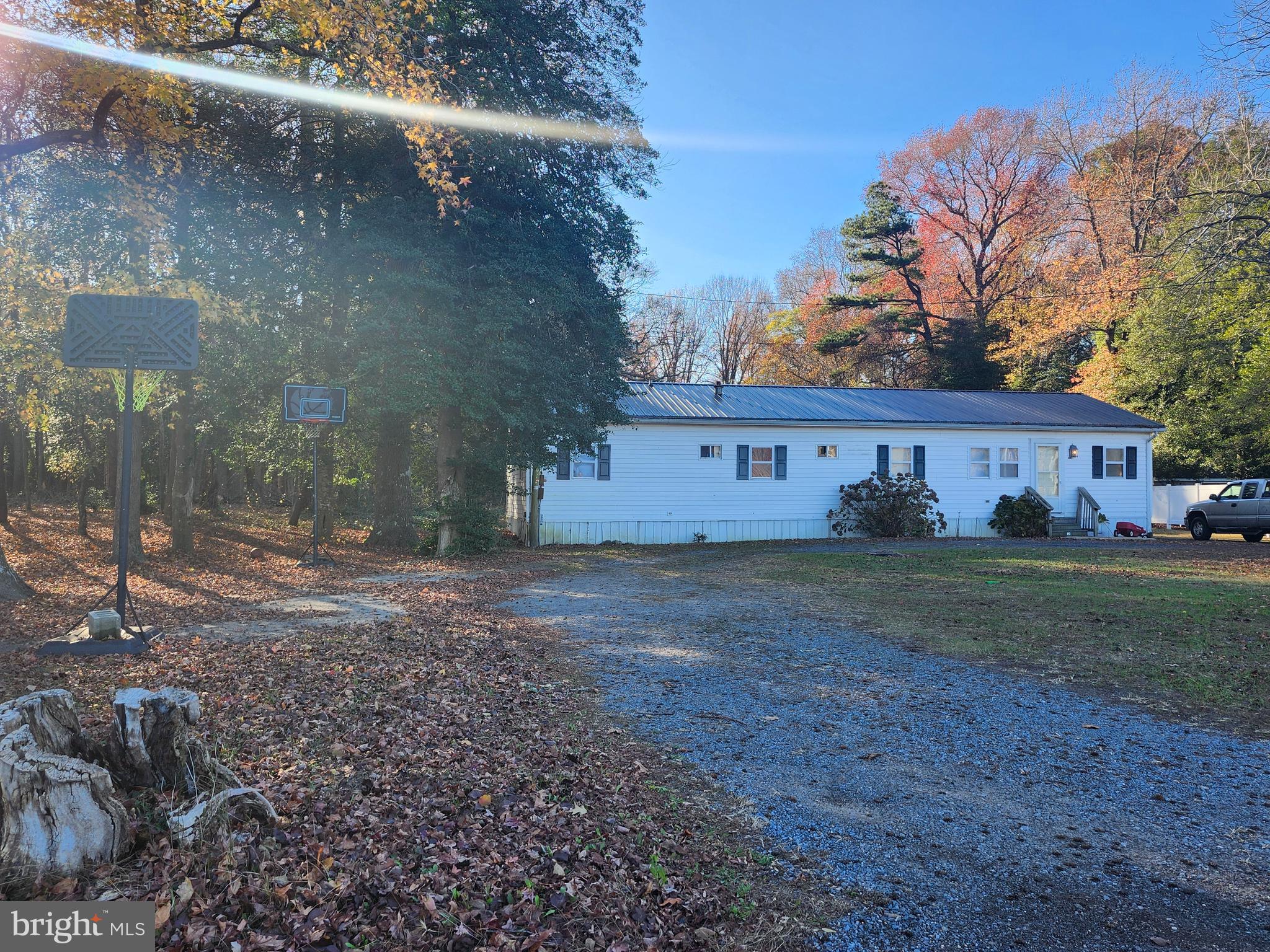 a view of a house with a back yard