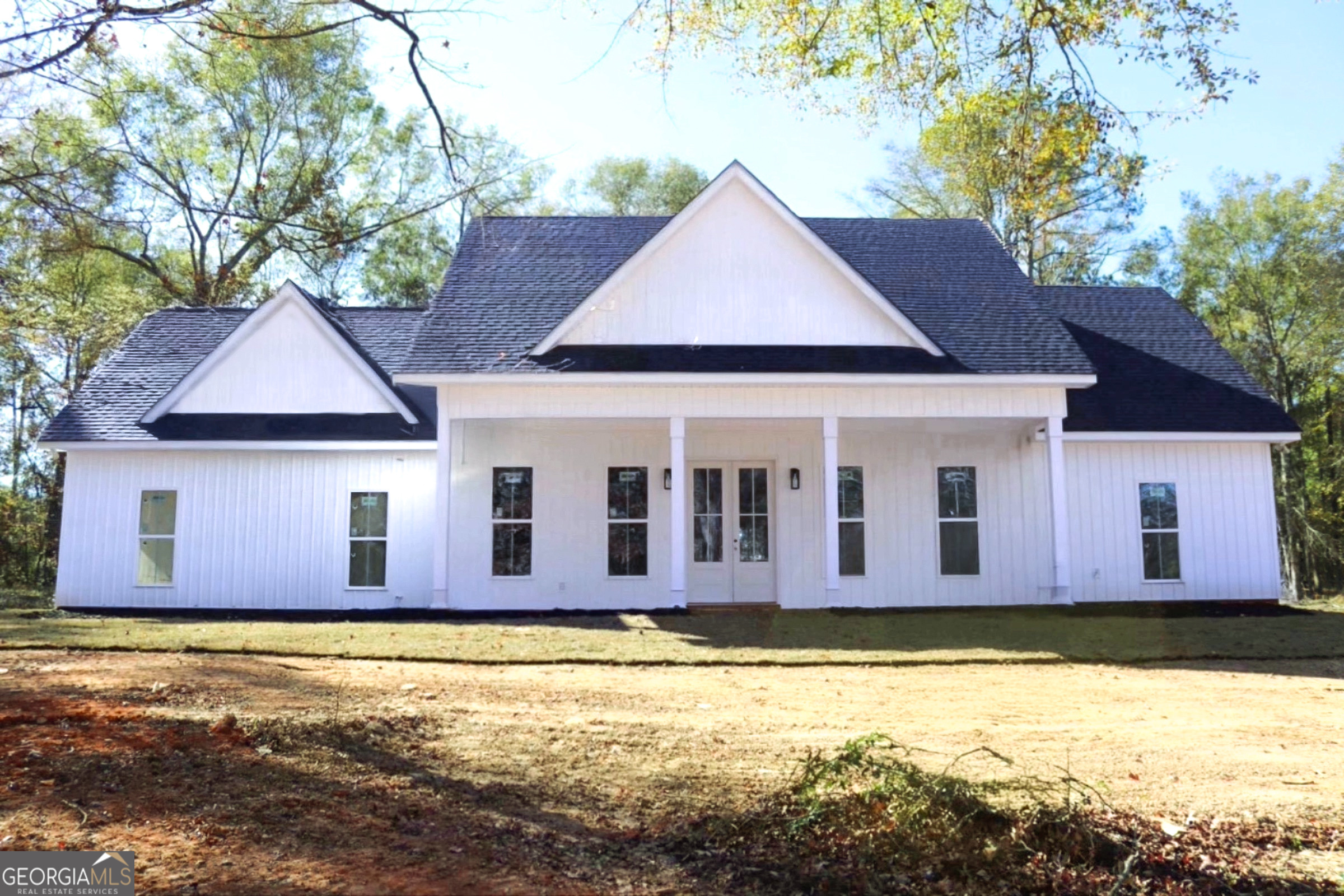 a front view of a house with swimming pool