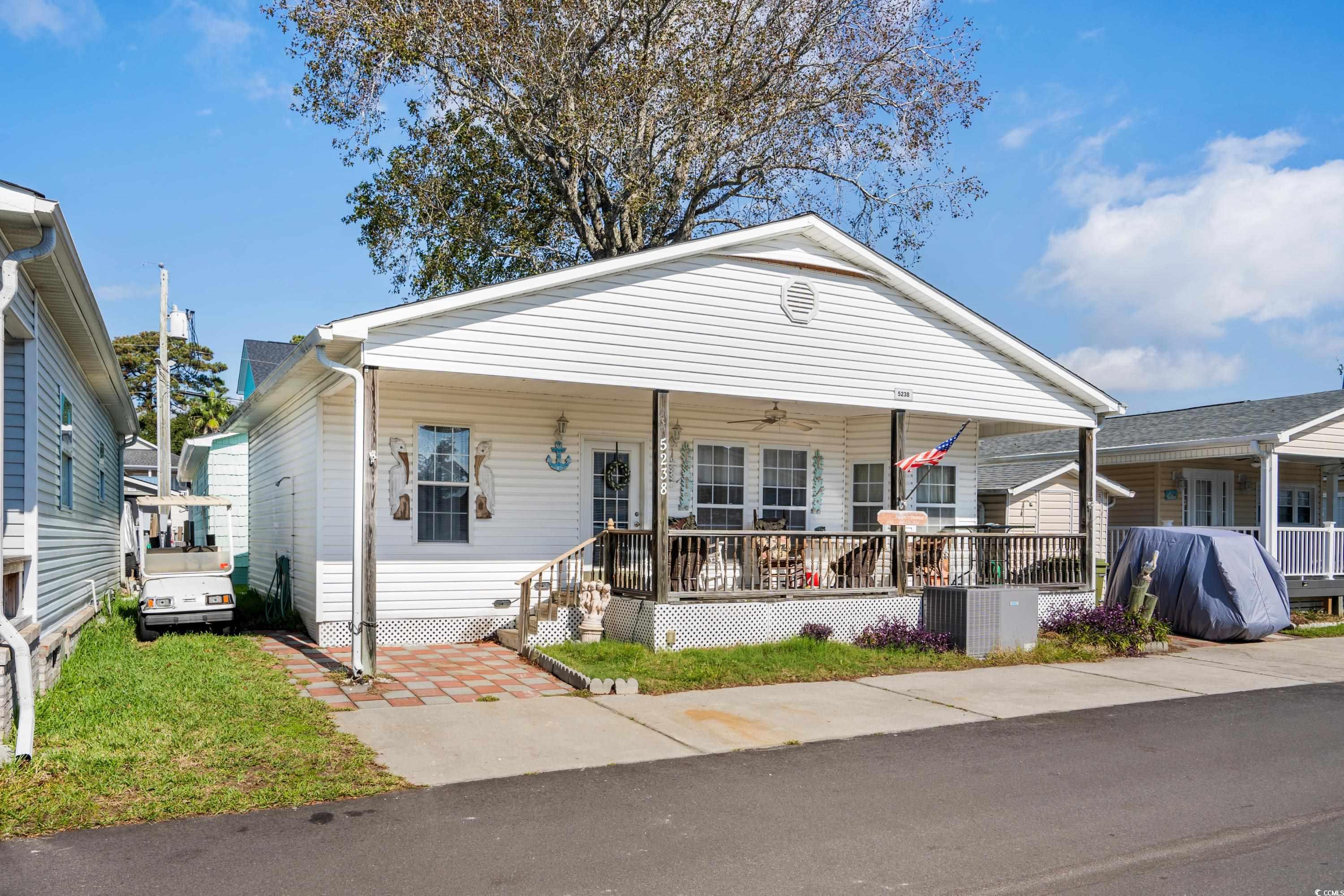 Bungalow-style home with covered porch