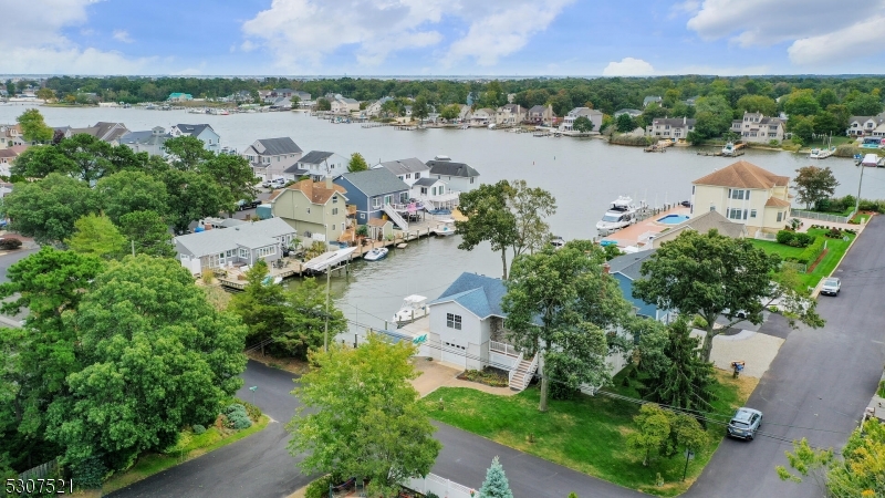 an aerial view of a city with lake view