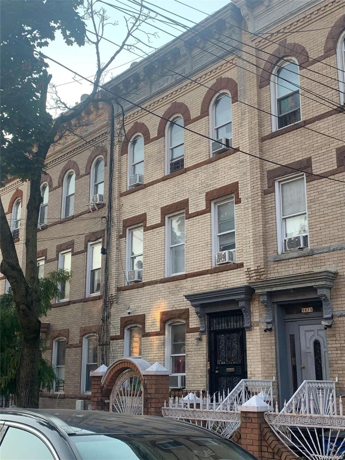 a front view of a building with balcony