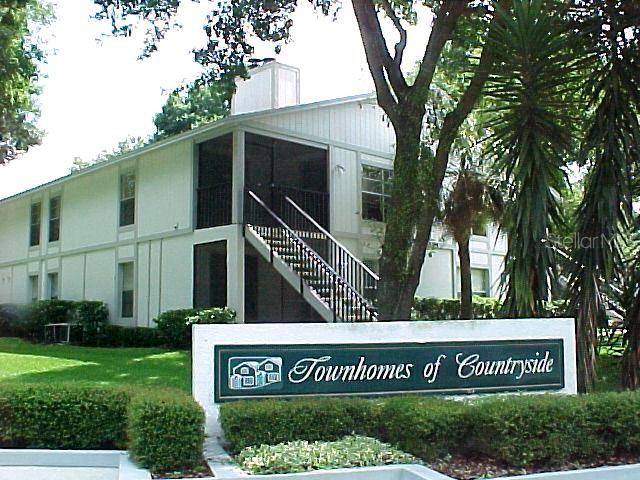 a view of a sign in front of a house