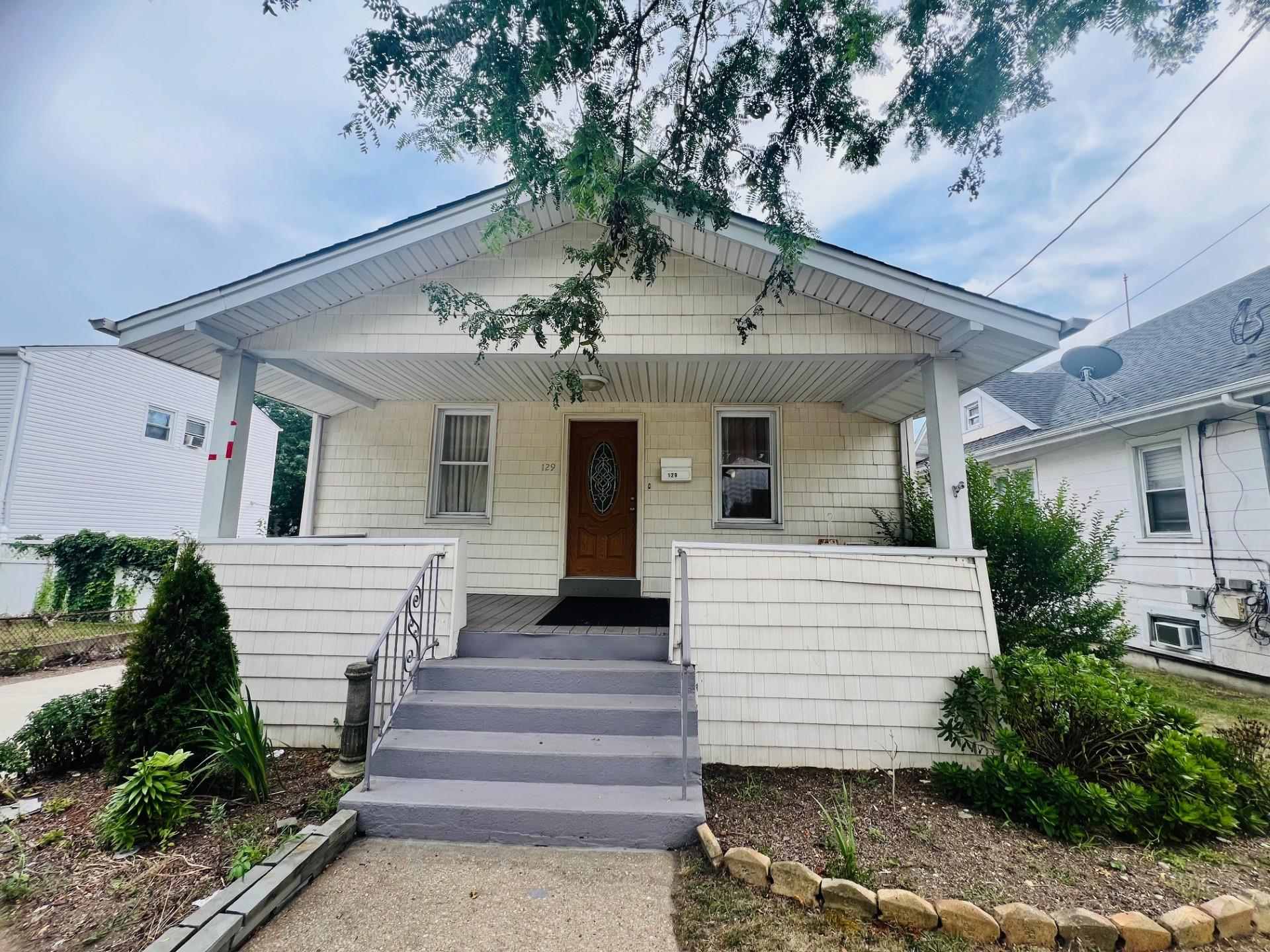 Bungalow-style home featuring covered porch