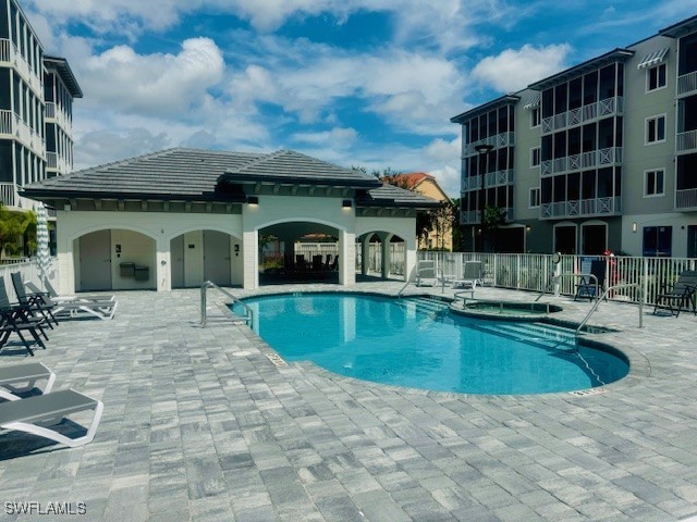 a view of pool with outdoor seating