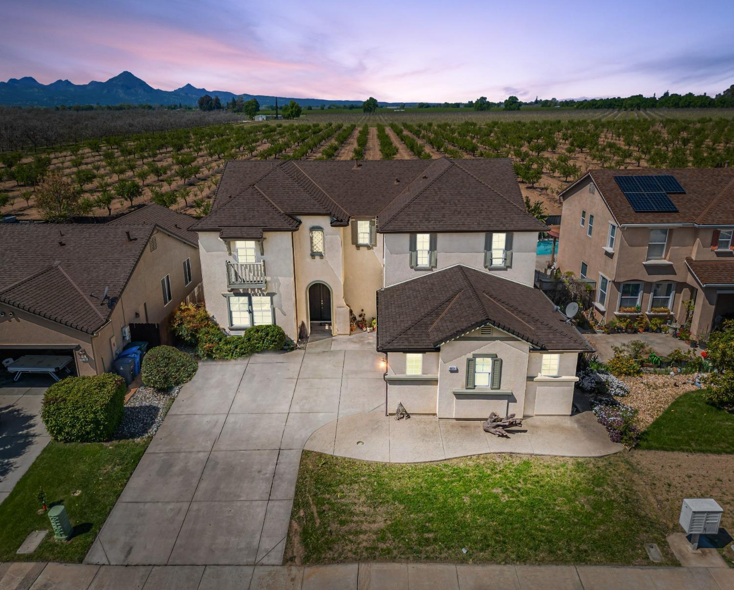 an aerial view of house with yard