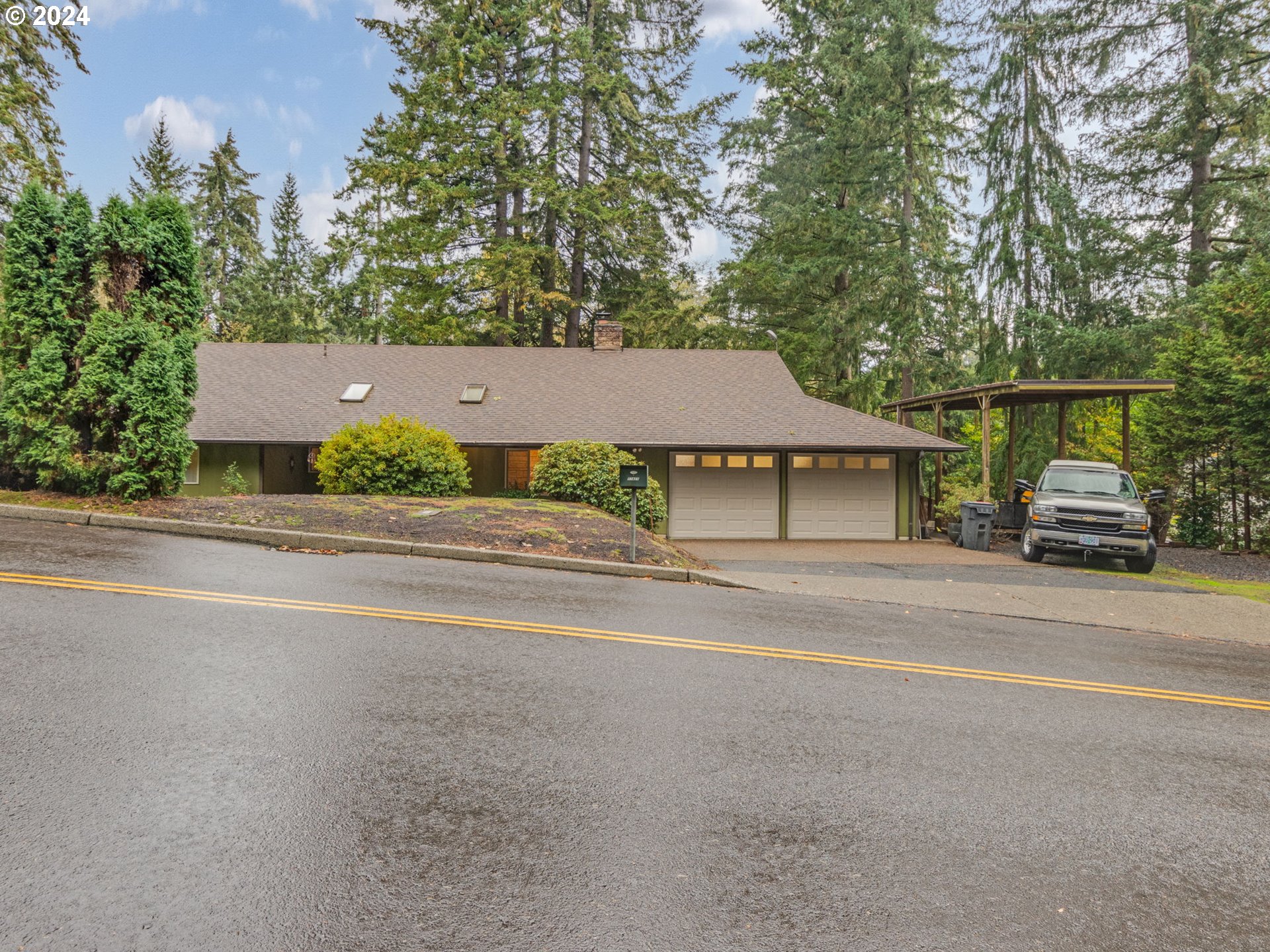 front view of a house with a street view