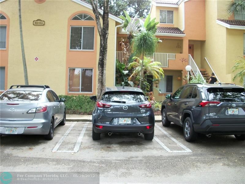 a car parked in front of a house