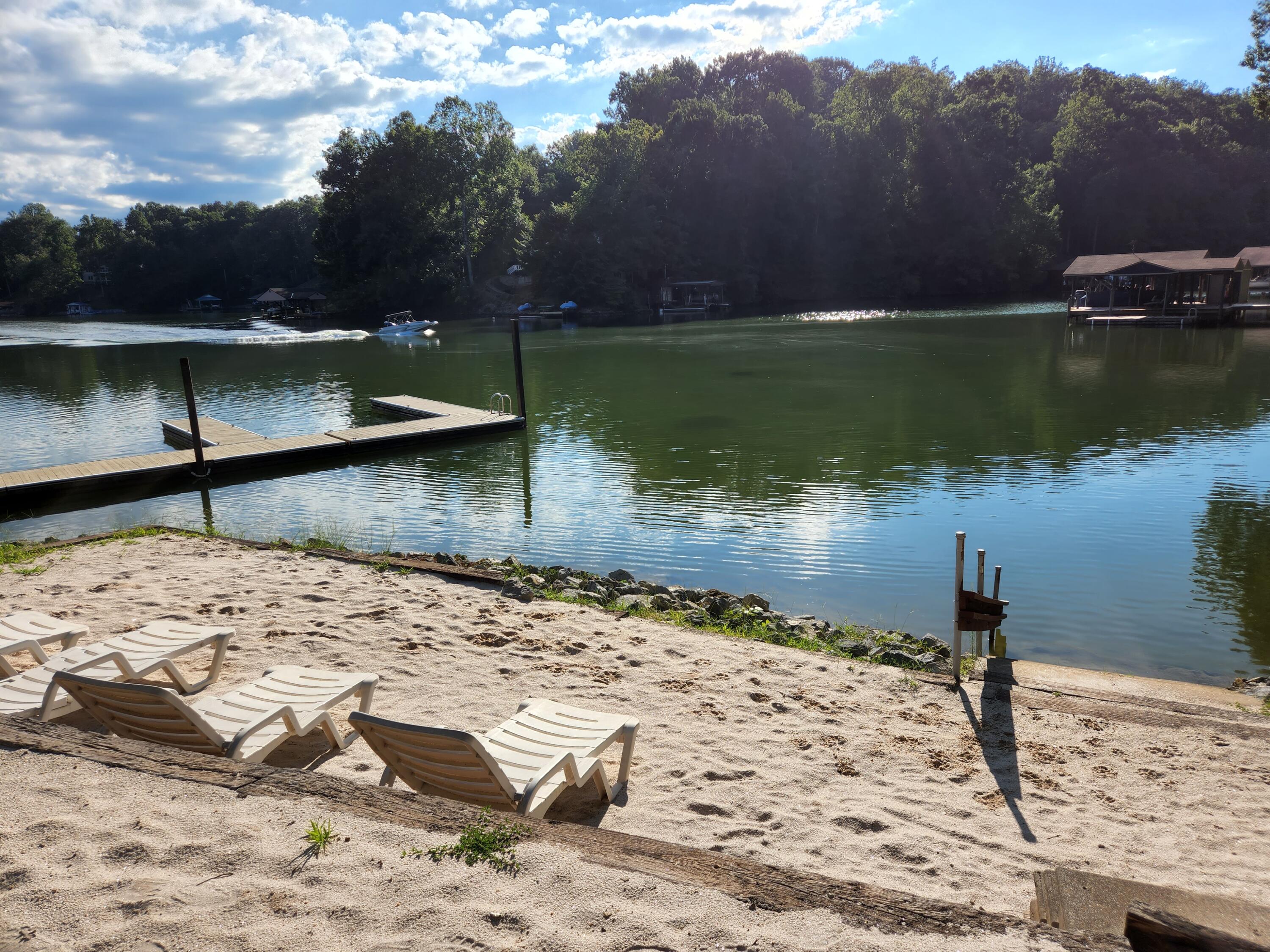 a view of a lake with a beach